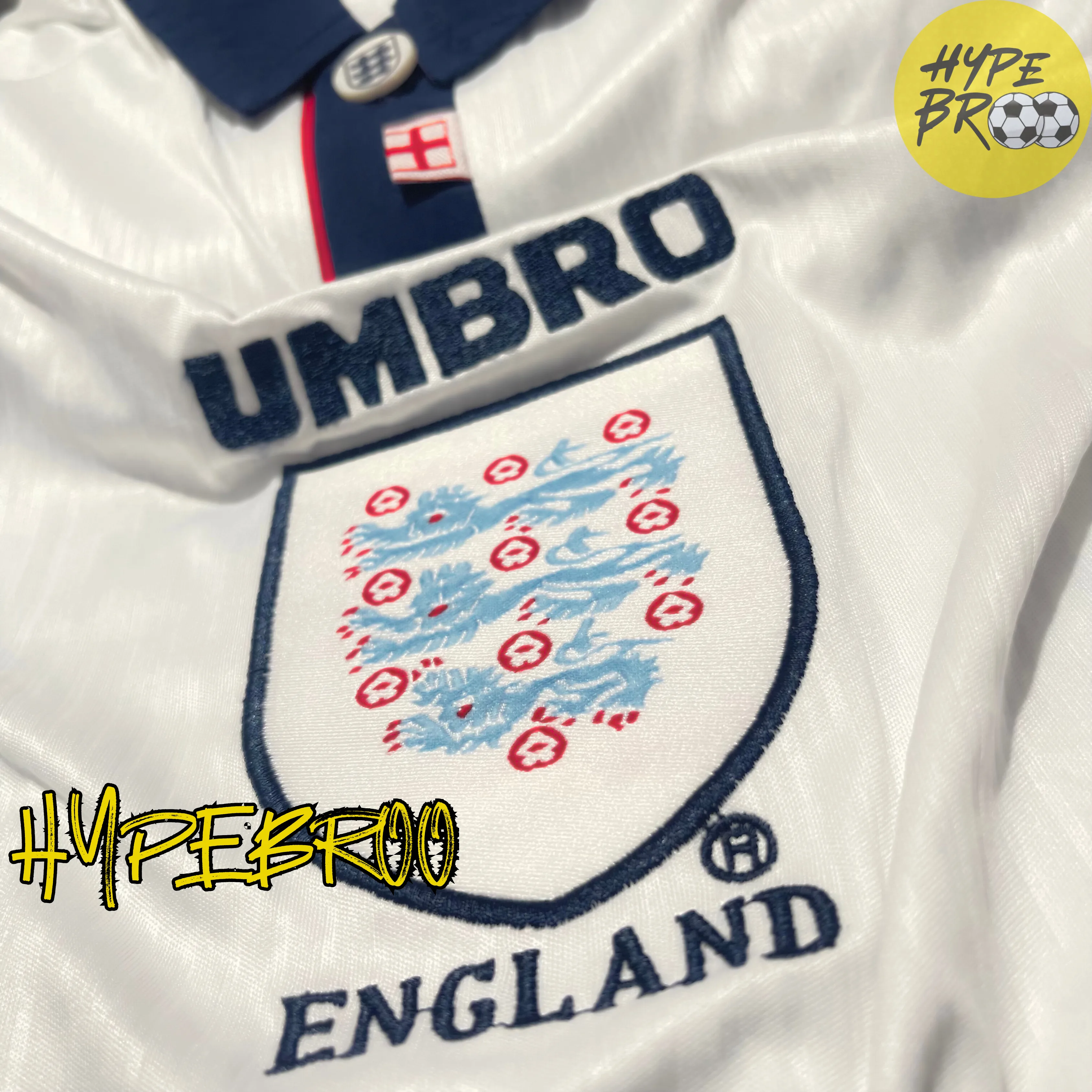Close-up of England crest and Umbro logo on 1998 home jersey