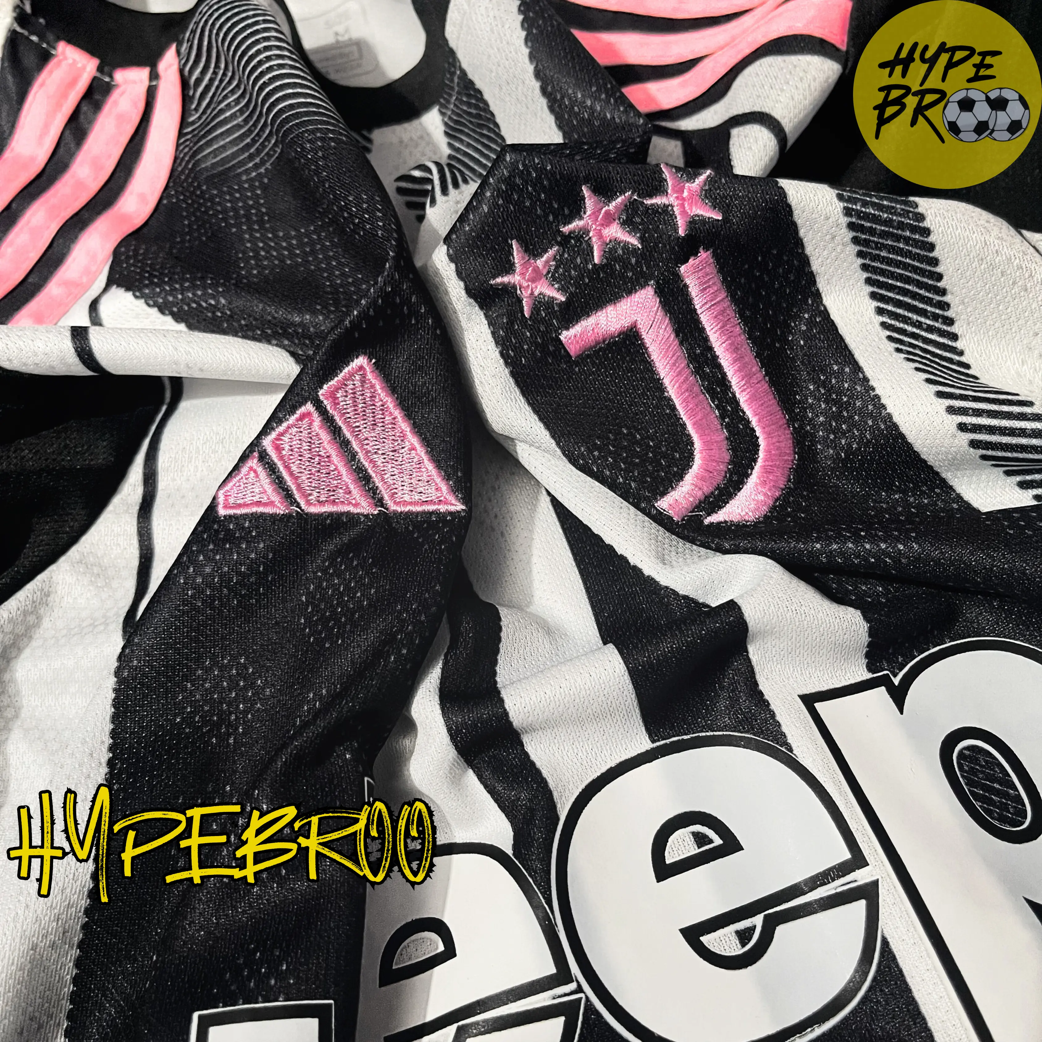 Close-up of Juventus crest and Adidas logo on 2025-26 home kit