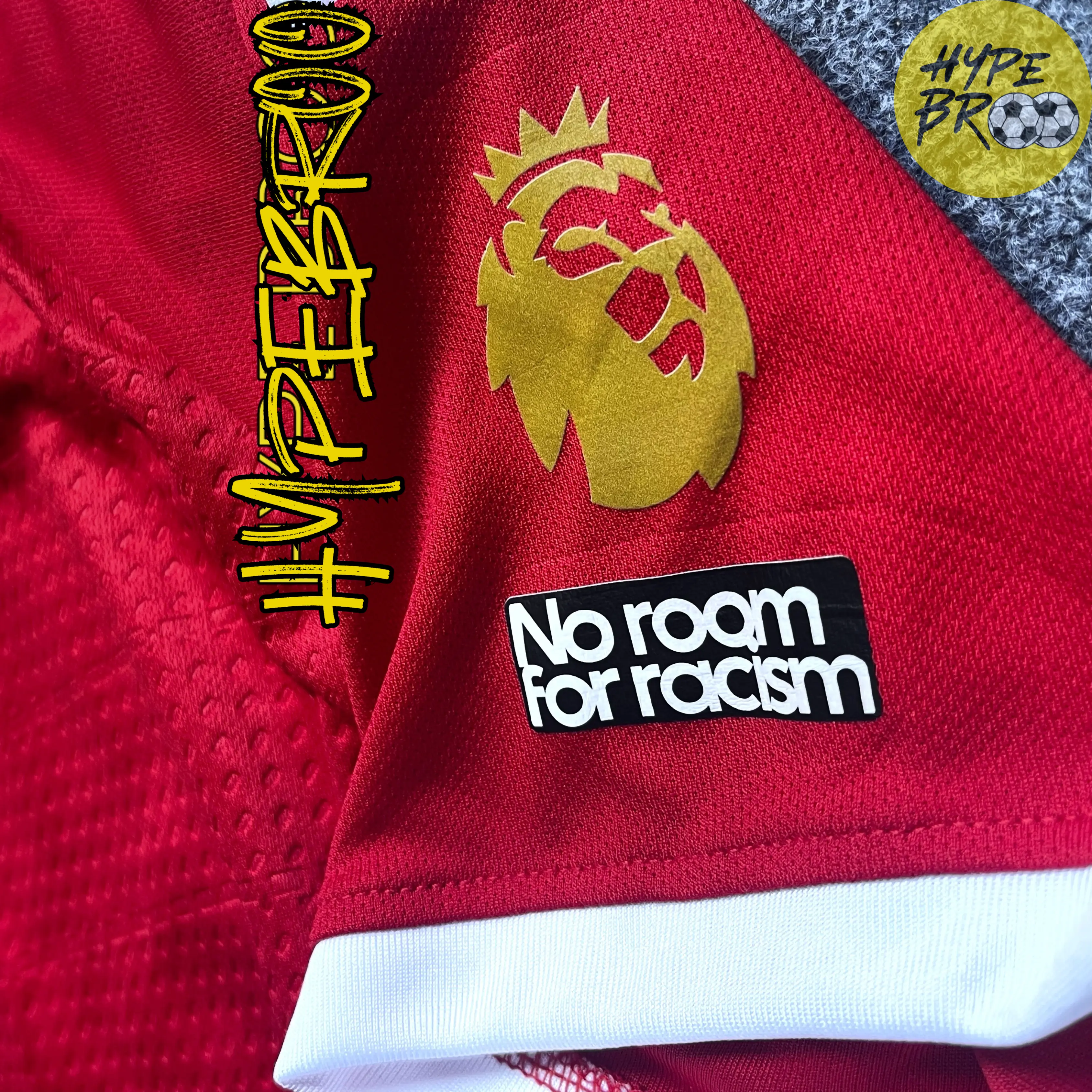 Close-up zoom of Premier League patch on Liverpool 2025-26 home jersey