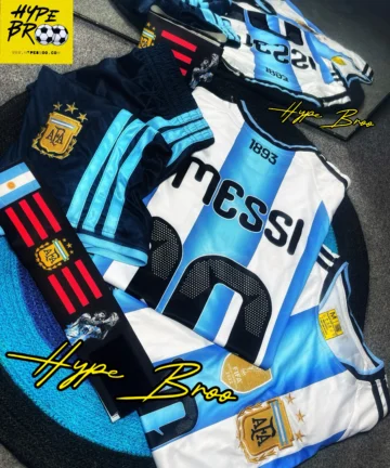 ARG-COMBO [ HOME JERSEY + MESSI10 NAME NUMBER + OFFICAL PATTERN SHORTS + MESSI WORLDCAP CAMPION EDITION CAPTAIN ARMBAND]